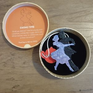 Erstwilder swing time brooch